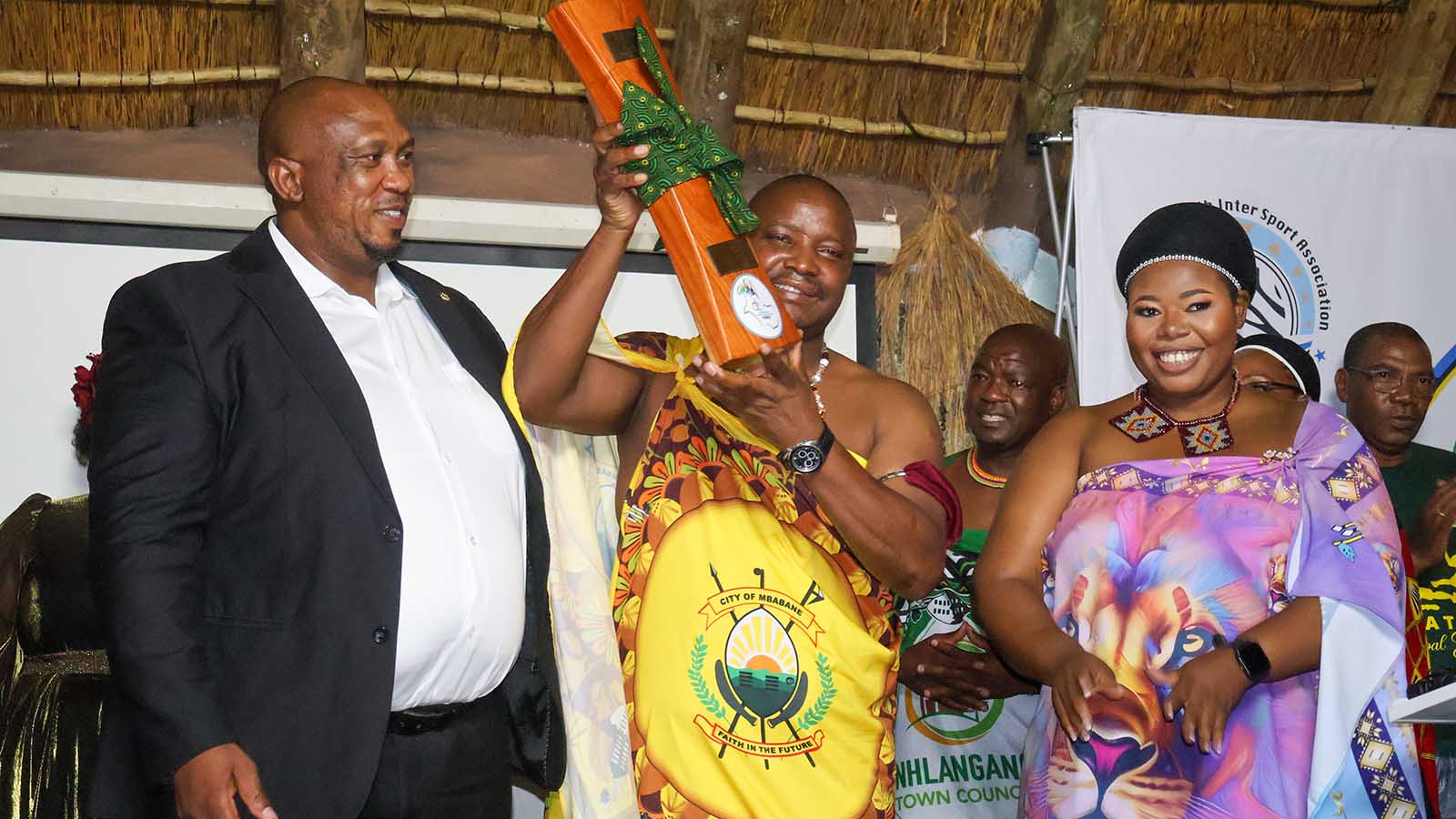Maseru Mayor Relebohile Sechacha (L) looks on after officially handing over the SAIMSA hosting baton to Eswatini. Celebrating the milestone is Mbabane Mayor Thulani Mkhonto, while Matsapha Municipality Mayor Lindiwe Dlamini observes the proceedings during the launch at Esibayeni Lodge. (Pic: Nimrod Hlophe)
